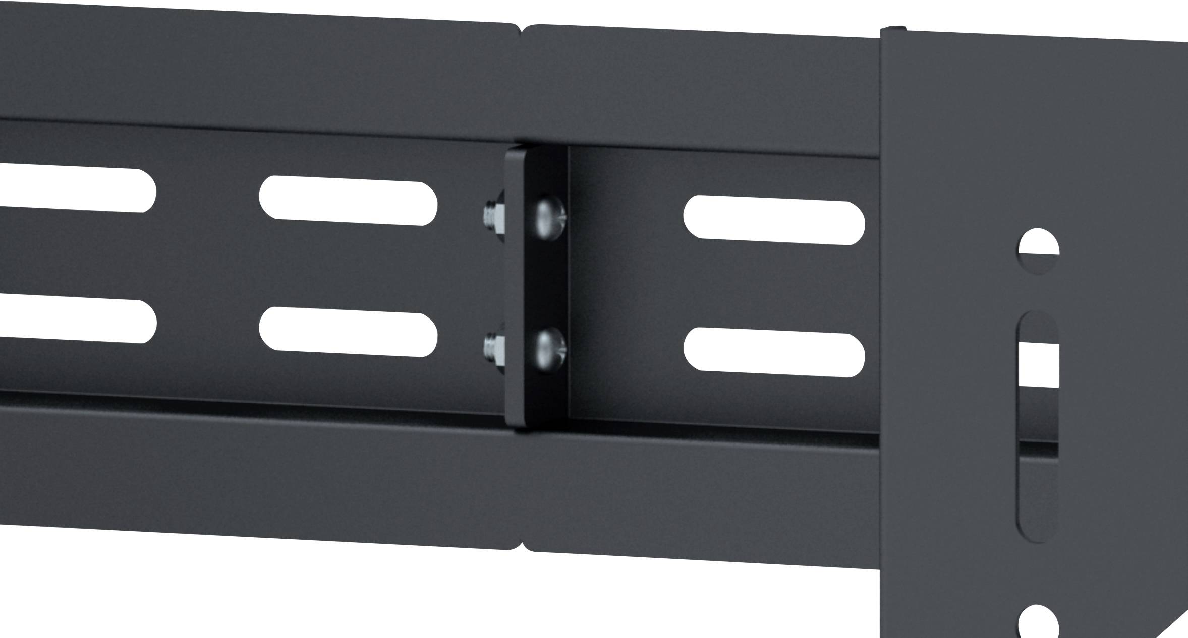 A black metal shelving unit with screws and oval slots for flexible mounting.