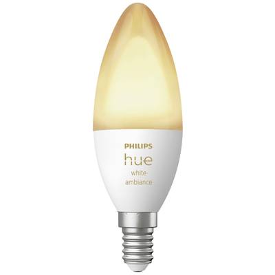 A Philips Hue LED bulb, white light, with an E14 bayonet cap, illuminates in a warm white tone.
