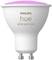 LED light bulb 'Philips Hue White and Colour' with GU10 fitting, illuminated pink at the top. Suitable for coloured lighting.
