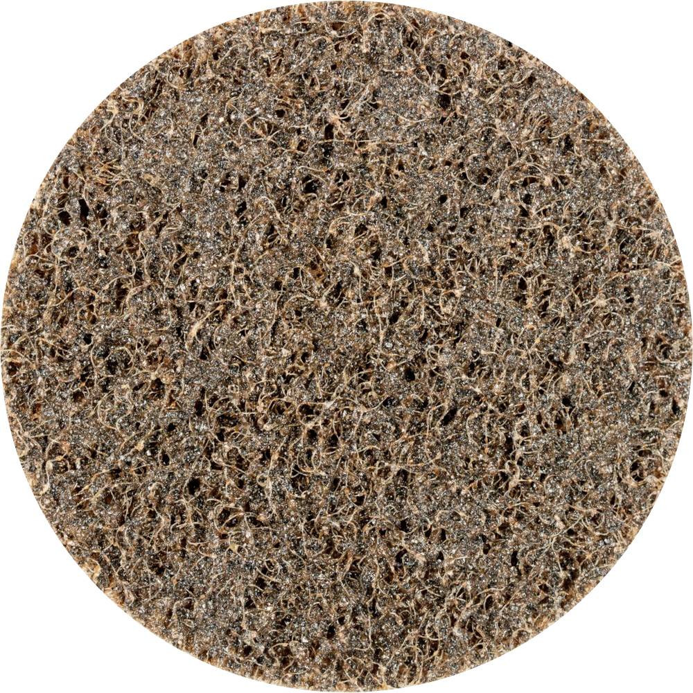 Circular grinding disc with a coarse, brown texture, likely made from compressed non-woven fabric, for sanding work.