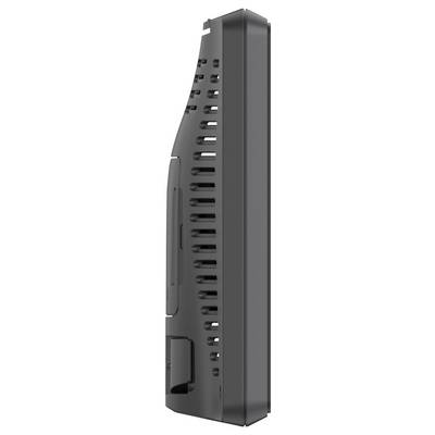 Sleek, black electronic device viewed from the side. It has ventilation slots and a slot for connections, possibly a gaming console system.