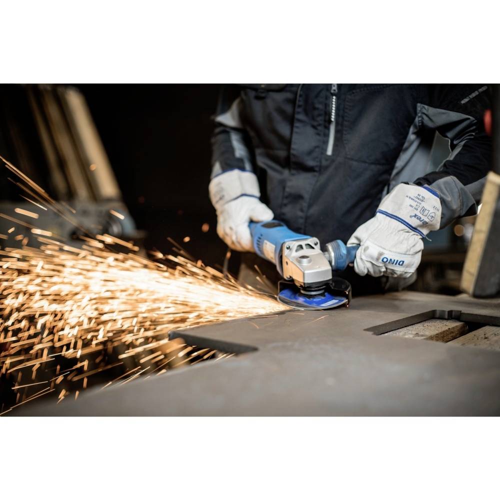 A person is cutting metal with an angle grinder, sparks flying. The person is wearing protective clothing and gloves.