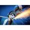 An angle grinder cuts through metal, sparks flying. It is being held by a person wearing protective equipment.