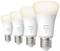 Four Philips Hue White LED light bulbs in a row, each producing 800 lumens. Emphasising energy efficiency and warm white light.