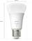 A white Philips Hue LED light bulb, 1100 lumens, with dimensions: 60 mm diameter, 110 mm height.