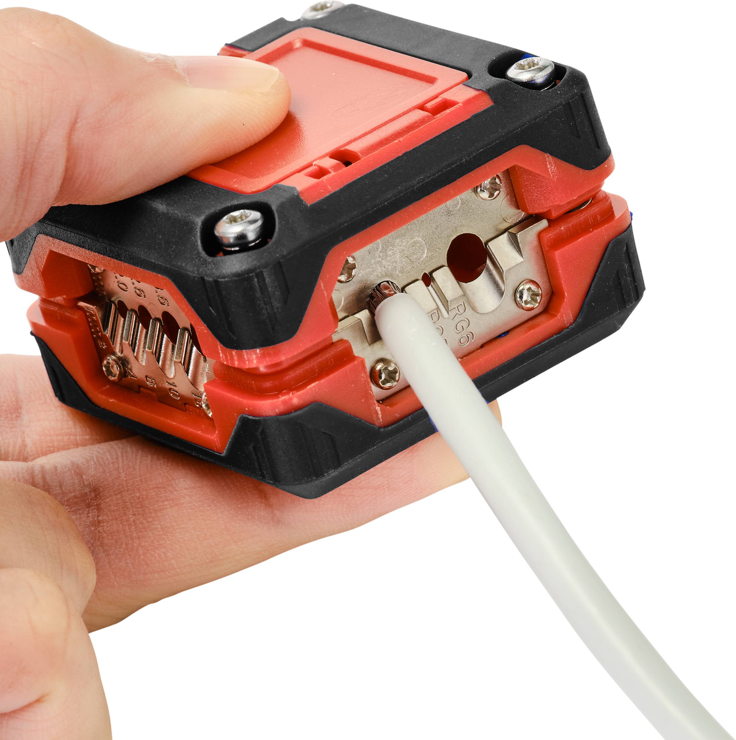 A hand is holding a crimp connector while a cable is being inserted into a metal clamp. The connector has red and black elements.