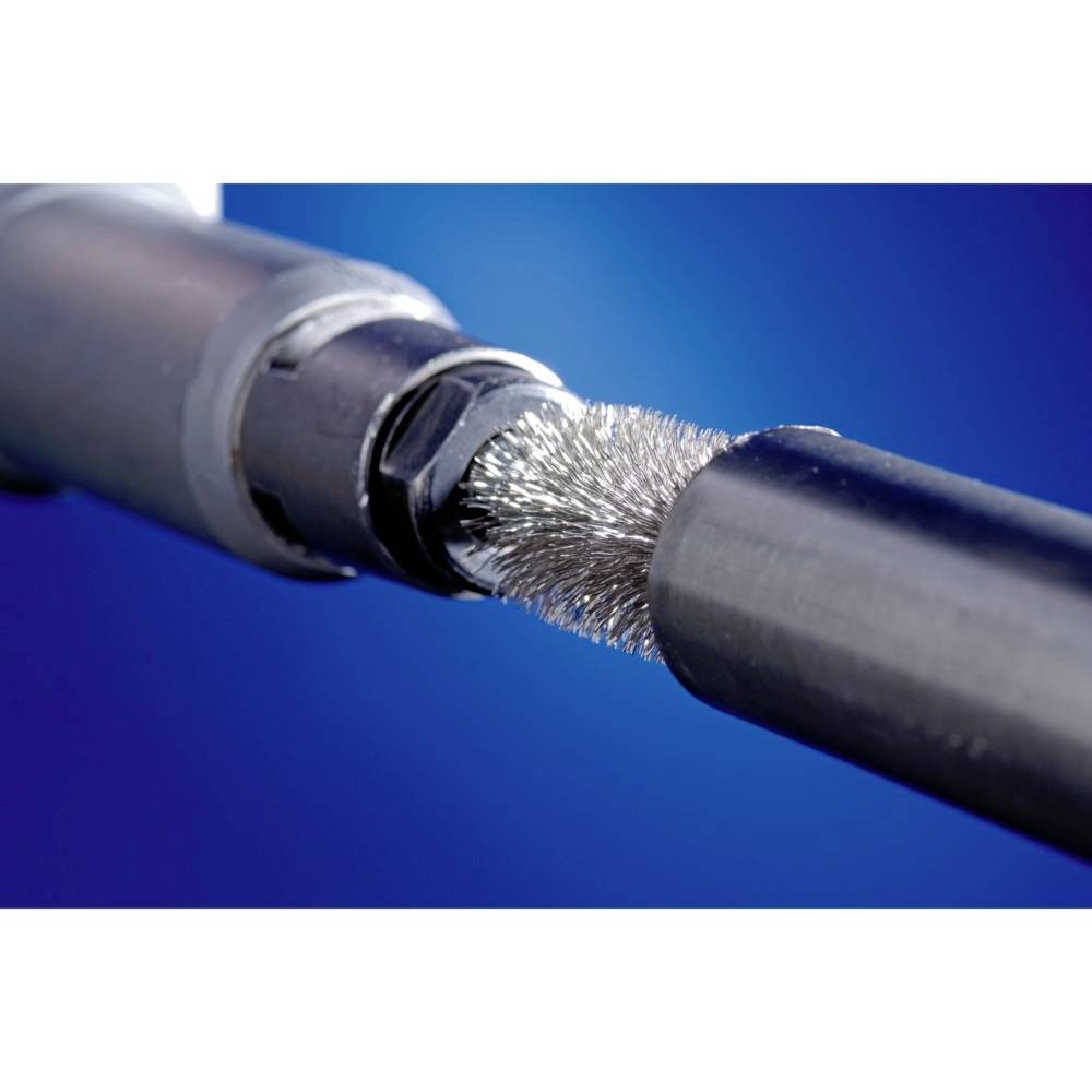 Close-up of a mechanical cleaning tool with a wire brush, suitable for processing metal surfaces.