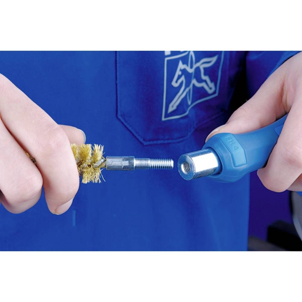 A person is holding a tool with a blue cover in their right hand and a wire brush in their left hand.