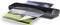 The image shows a laminating machine laminating a photo with a landscape motif. The device is black and has a power button.