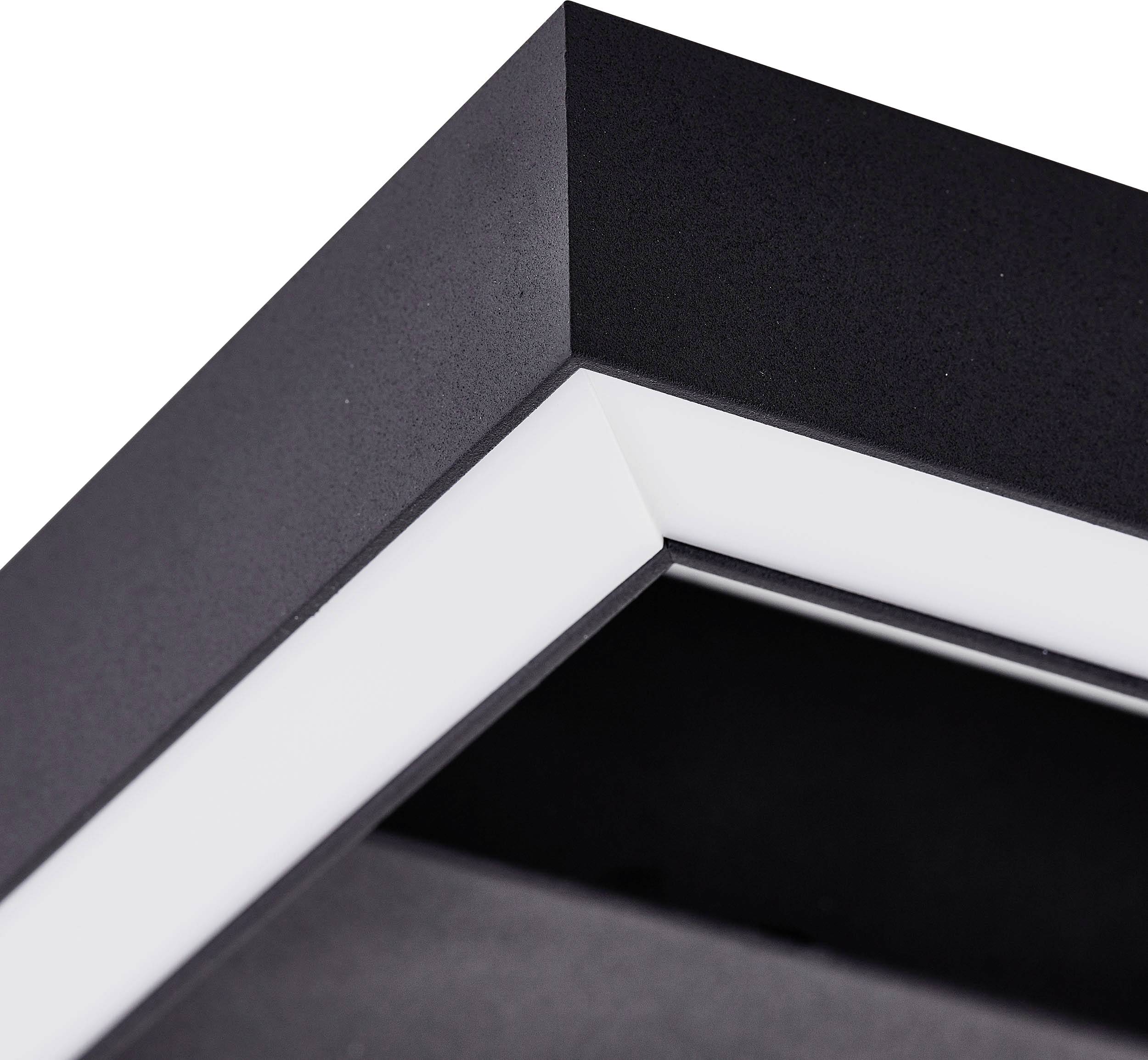 A black frame with an angled edge, white inner margins, and no visible content, shown from a close-up angle.