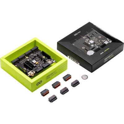 Arduino developer kit with black circuit board, connectors, and battery, in a green and black packaging, on a white background.