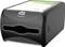 A black Tork Xpressnap napkin dispenser with a document placed on top.