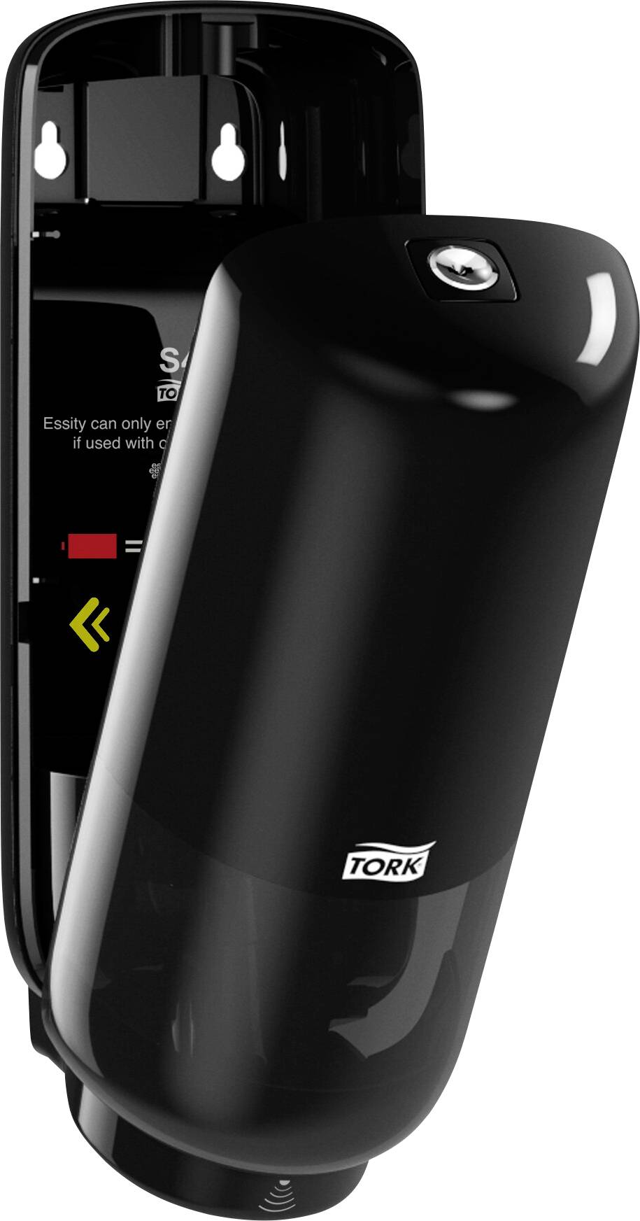 A black Tork soap dispenser mounted on the wall, open, with its internal mechanism visible.
