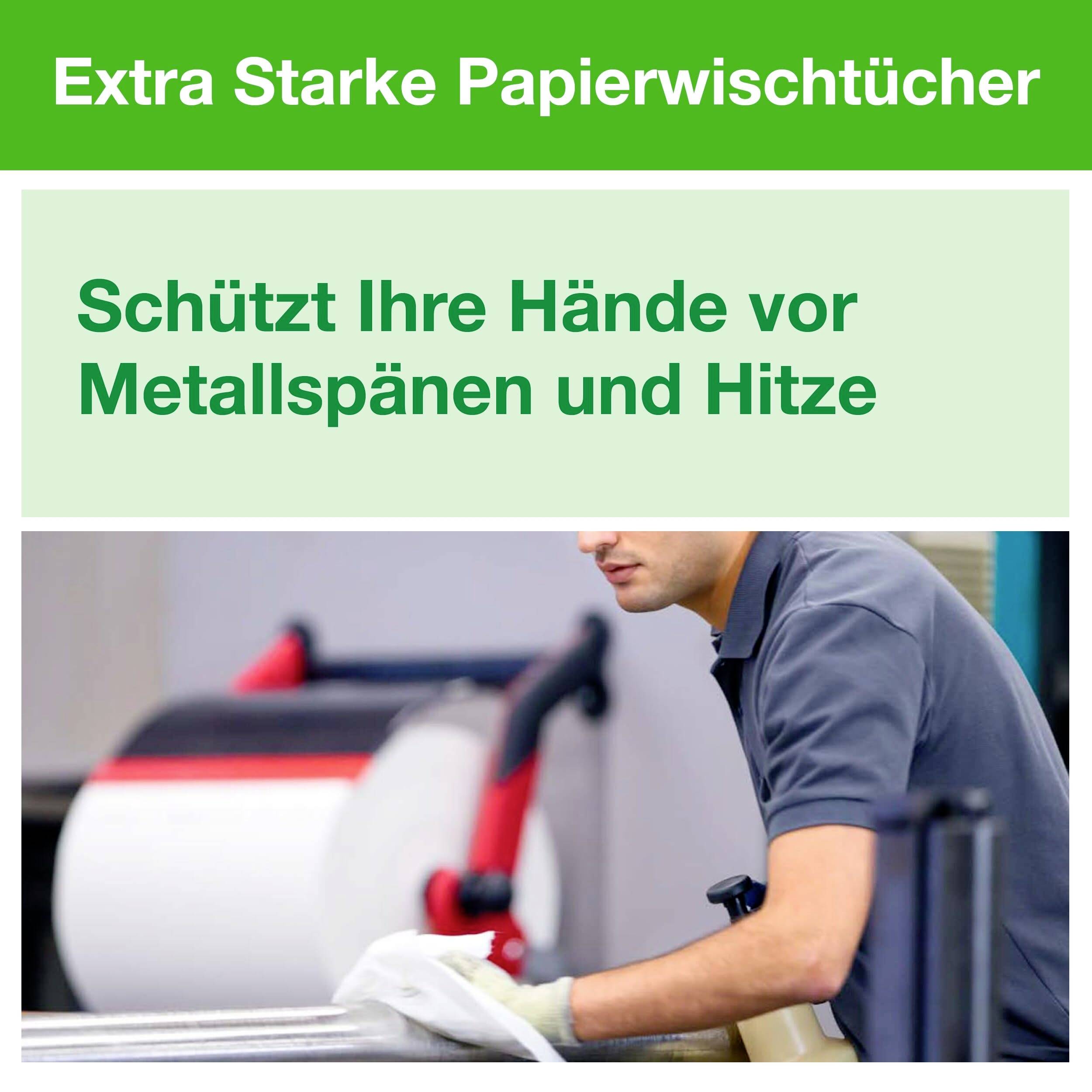 Worker uses heavy-duty paper wipes to keep metal shavings and heat away from hands; 'Extra Strong Paper Wipes'.