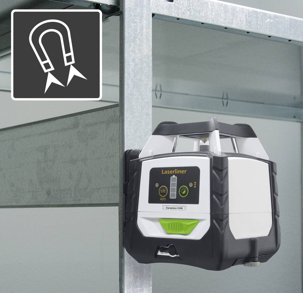 A laser levelling device is attached to a metal edge. A magnet symbol indicates that the device is adhering by magnetic force.