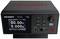 Electronic voltage source with digital display showing voltage and current. Includes control buttons and terminals for current connections.