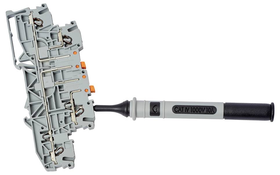 'Isolation message adapter for terminal blocks' with grey mounting bracket and black handle, used for electrical safety tests.