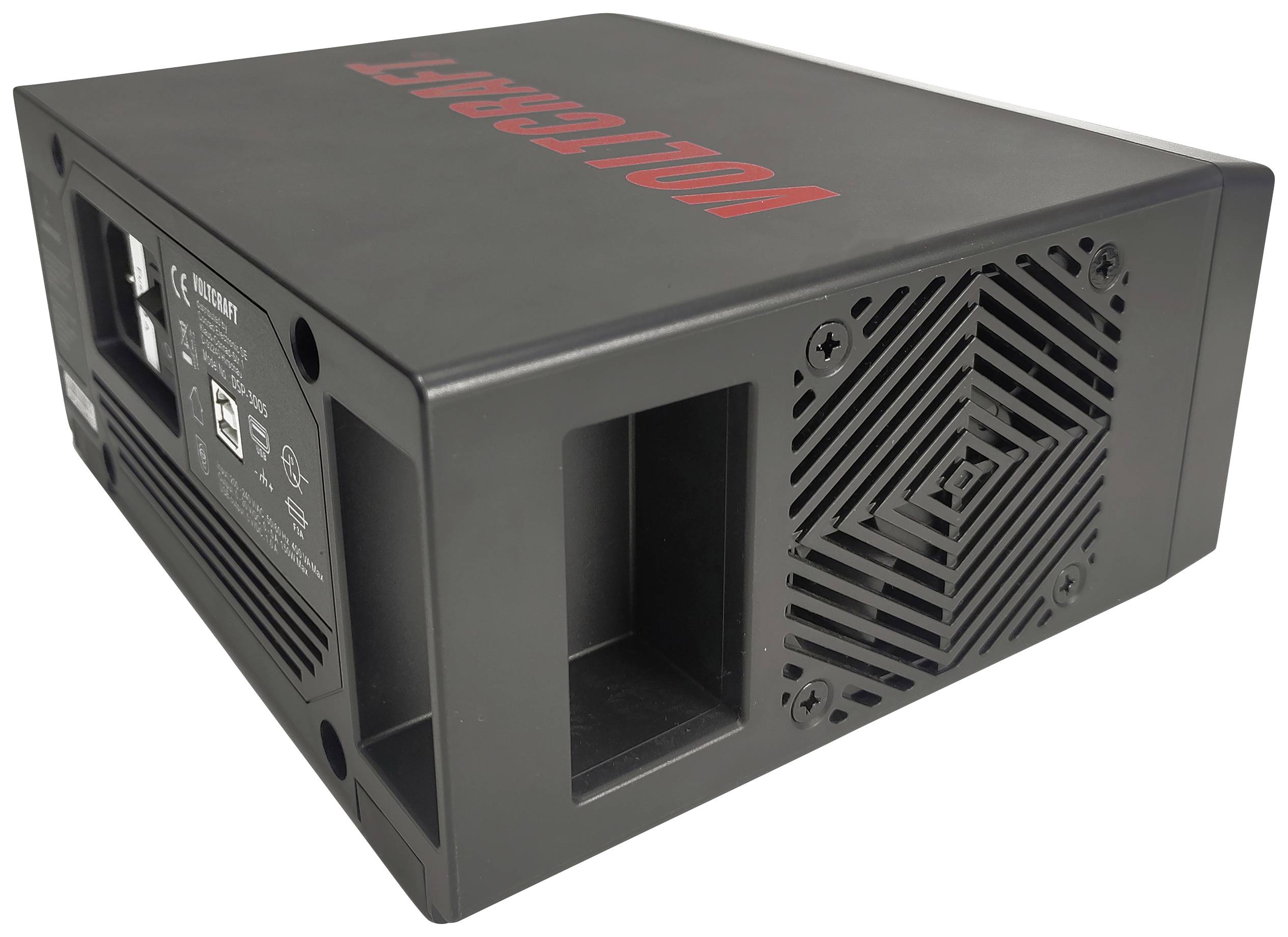 A black device with a fan on the side and the red lettering 'VOLTCRAFT' on the top surface.