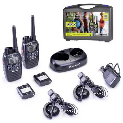 Two two-way radios with batteries, charger, power supplies and headsets. Packaging shows people using two-way radios. Model: G7 PRO Work Edition.