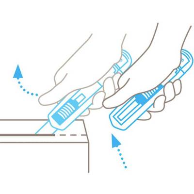 Two hands hold a Stanley knife and cut a cardboard box. One hand keeps the box stable while the other guides the blade.