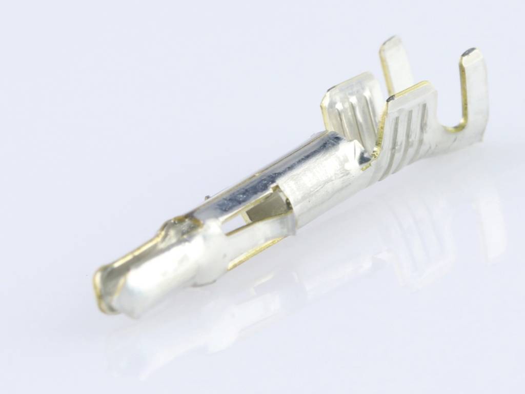 Silver electrical plug contact component on a white background, typical of cable connections in electronic devices.