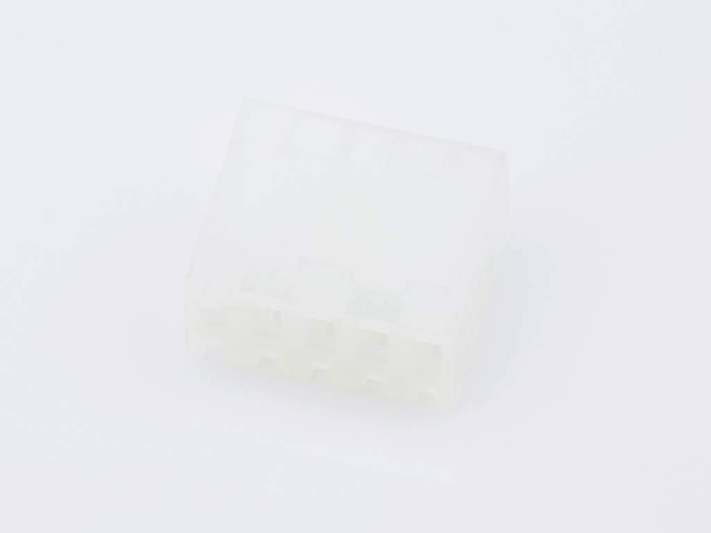 A white electric plug with multiple sockets on a neutral background.