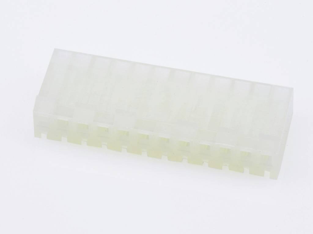 A rectangular, transparent plastic connector with multiple parallel slots, likely for electronic connections.