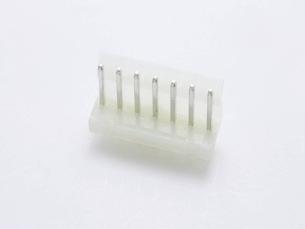 A white plastic plug with six metal pins on a white background.