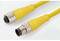 Yellow cable with metallic, round plug and socket. Suitable for industrial applications, robust and reliable.