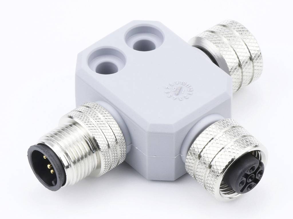 A grey-metallic triple connector with three circular terminals in a right-angled housing.
