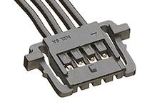 Black, rectangular electrical connector with four wires connected to pins. Predominantly used in electronic devices.