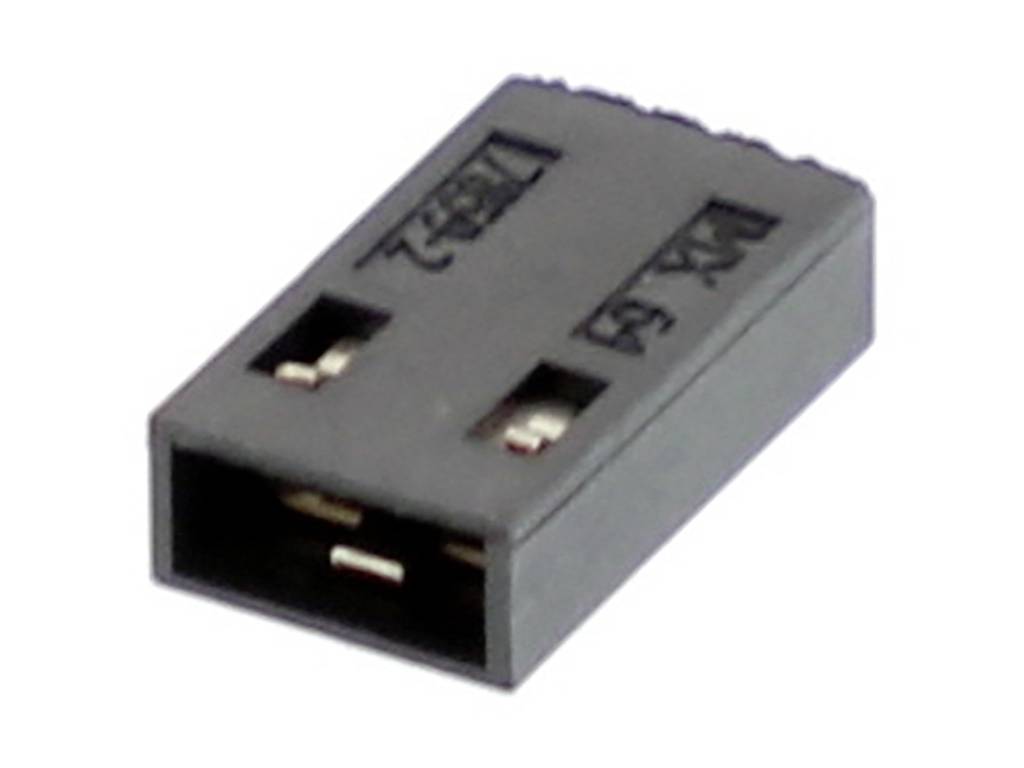 Black plastic plug with flat contacts, commonly used for electrical connections in electronics projects.
