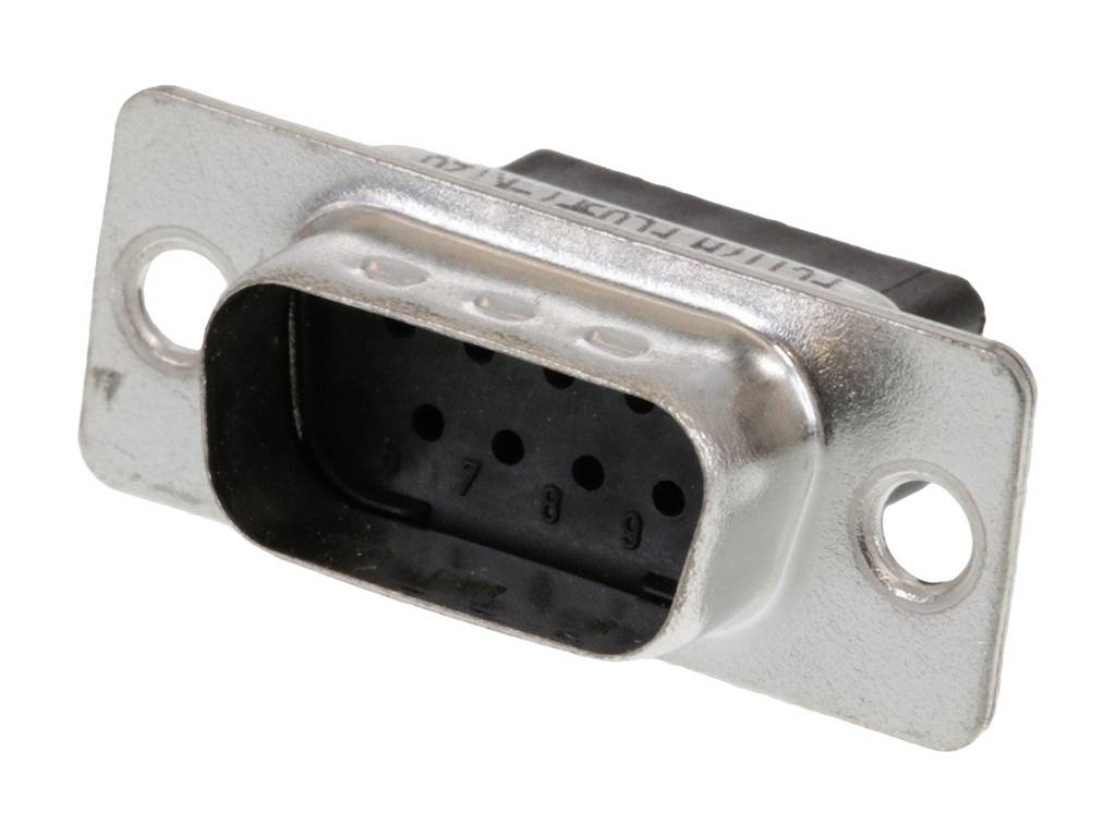 A DB9 plug, commonly used for serial interface connections in computer networks. Metal casing with nine contacts in two rows.