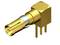 Golden electronic plug with a rectangular housing and multiple connection pins, suitable for applications in high-frequency technology.