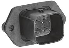 A black plastic plug with multiple metal pins used for electrical connections.