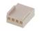 A beige plastic plug with four rectangular openings on the front, suitable for electrical connections.