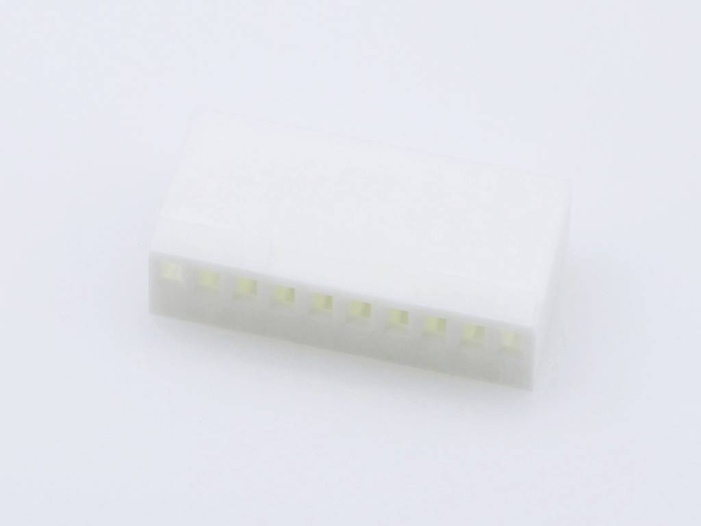 White, rectangular plastic plug with multiple connections, placed on a white background.