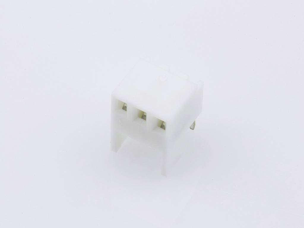 A white three-pin plug made of plastic, lying on a white surface, shows its pins.