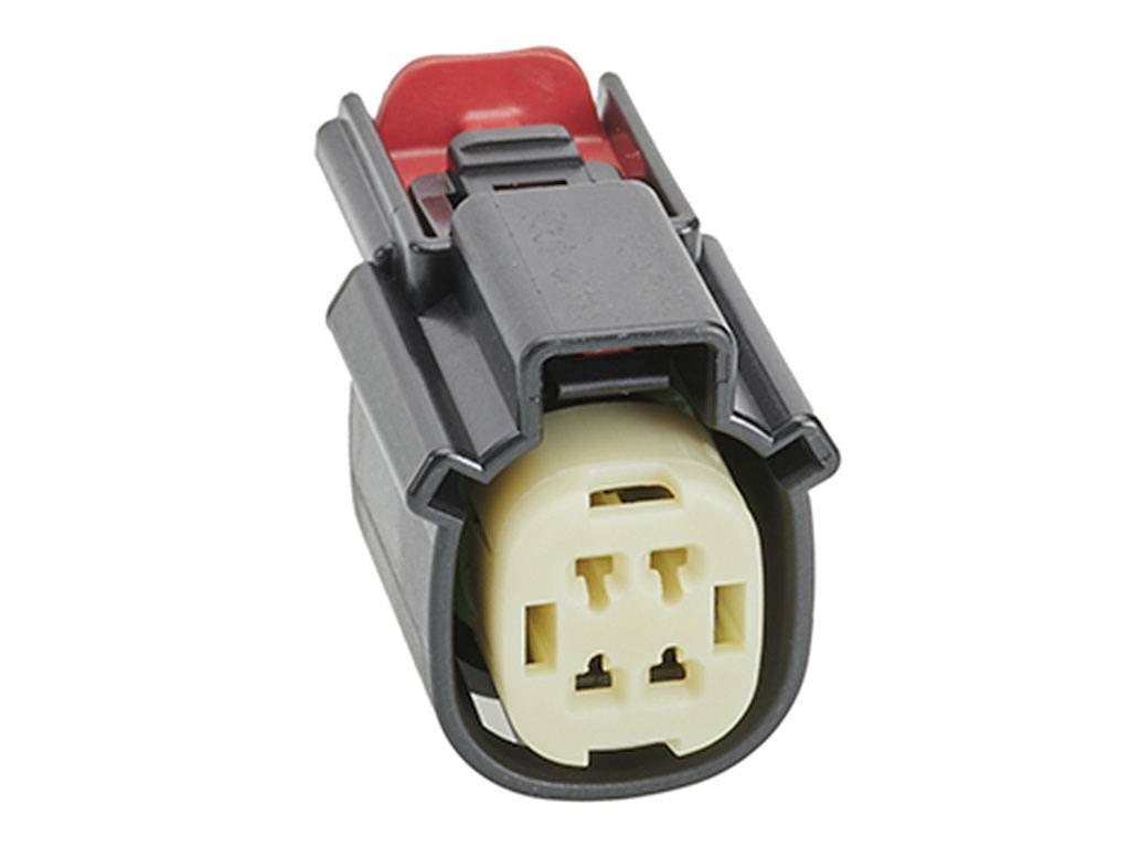 'Close-up of an electrical connector with a black housing and yellow interior, viewed from the front.'