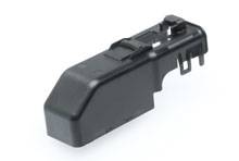A black plastic component with multiple connection points and an angled configuration, potentially an electronic module.