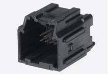 Black modular plug with multiple contact pins, typically used for network cable connections in IT systems.