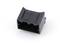 A black plastic plug with a rectangular shape, lying on a white background.