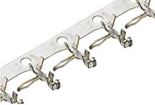 Several small, silver clips are attached in a row to a plastic strip.