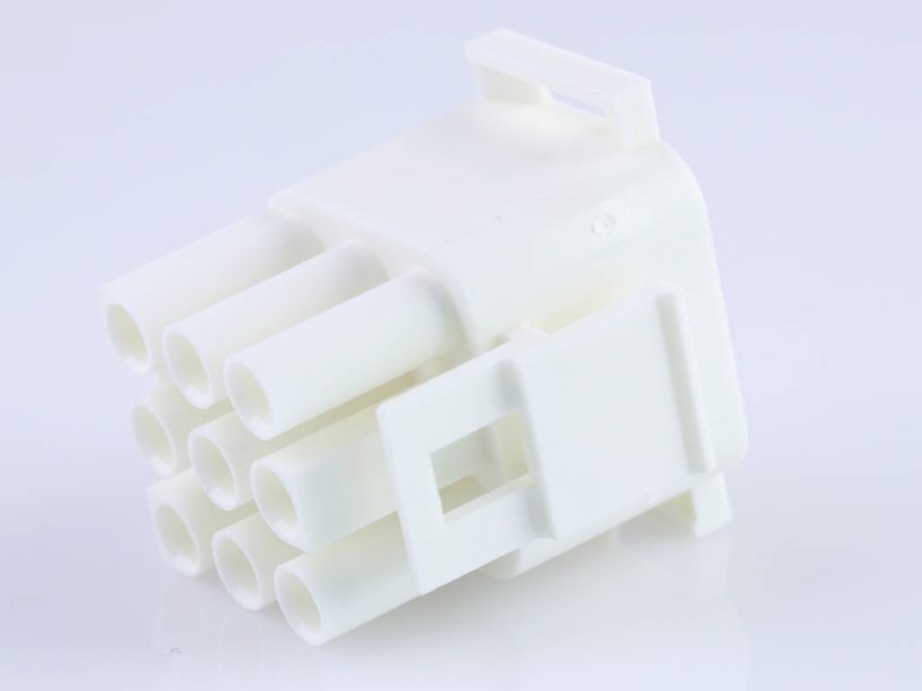 White connector with six round pins and a rectangular housing, possibly for electrical applications.