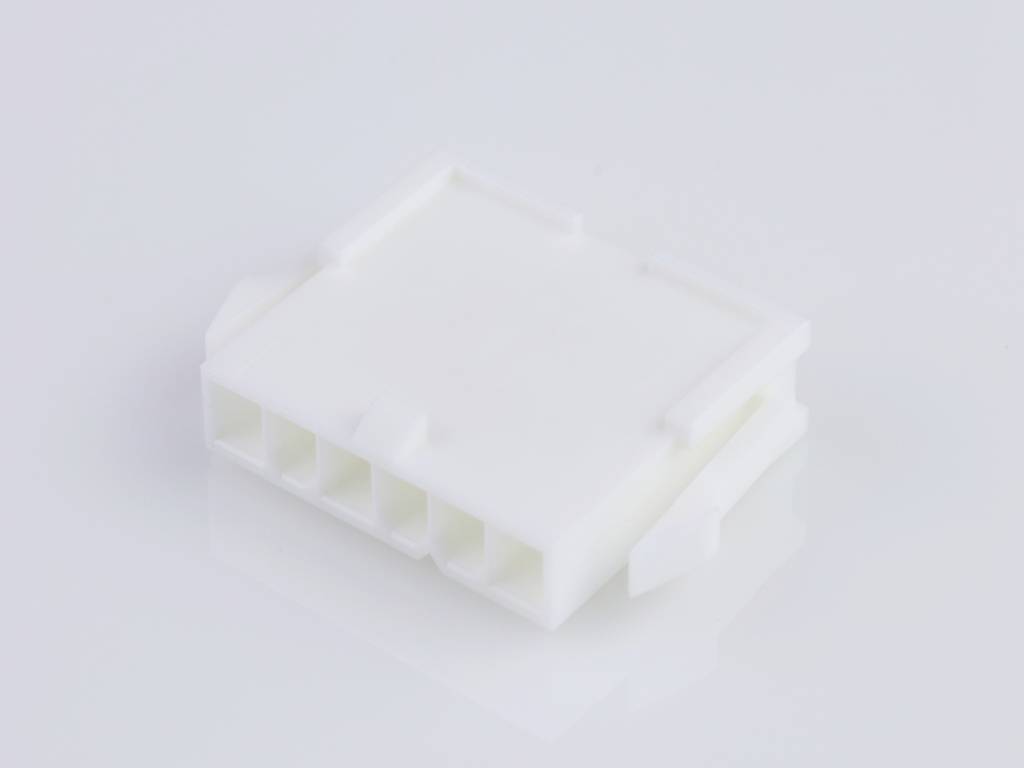 White, rectangular plastic plug with six openings, most likely for electronic cable connections.