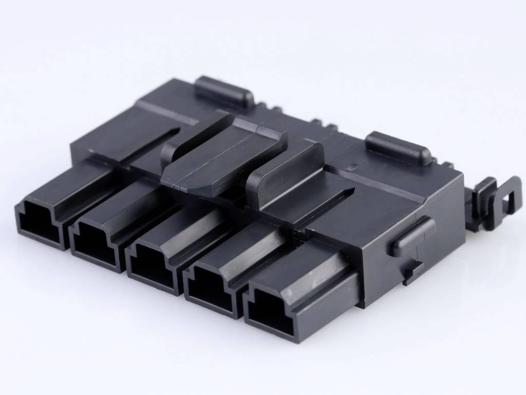 A black plastic plug with five sockets, suitable for electrical connection in electronic devices.