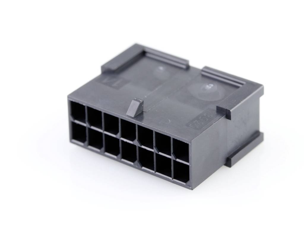 Black plastic plug with 14 square openings, arranged in two rows, for technical connections.