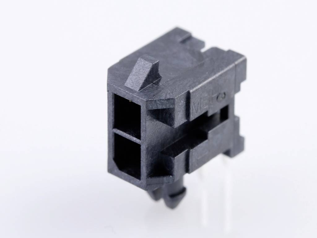 A black plastic object with rectangular and textured surfaces. It could be a technical connecting component.