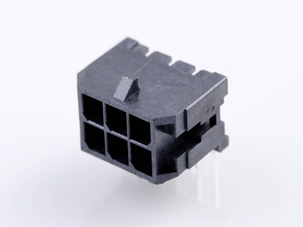 Black plastic plug with six square openings, commonly used in electronic devices. Inner contacts partially visible.
