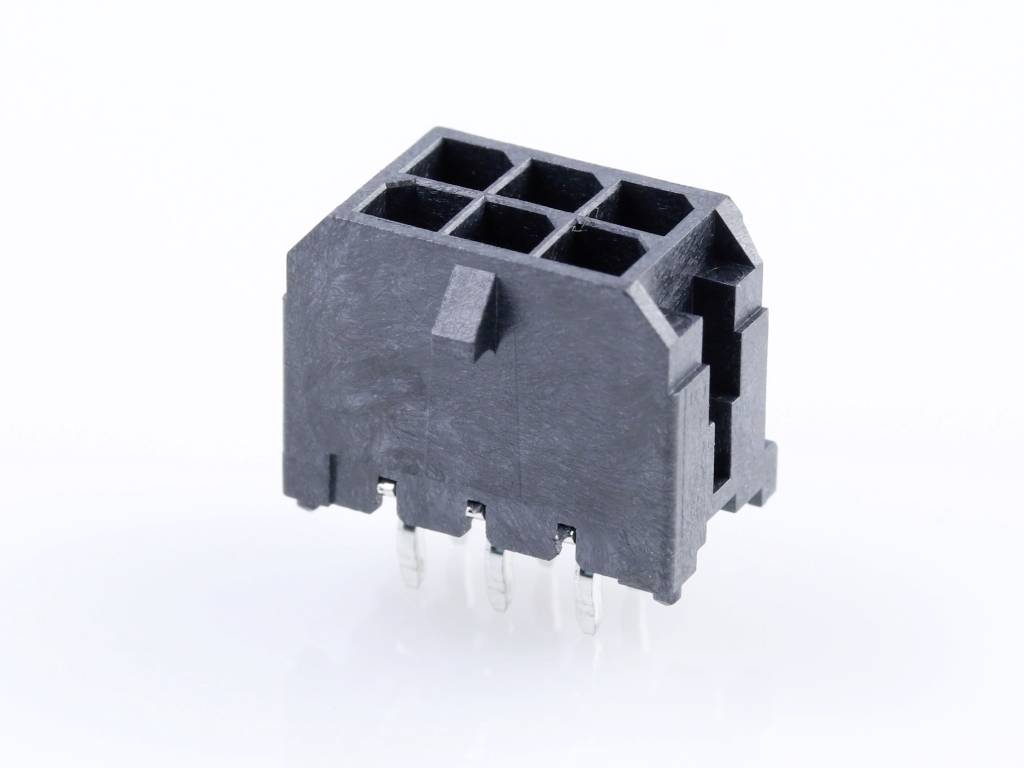 'Six-pole connector, black, with four metal pins on the underside. Used for electrical connections in devices.'